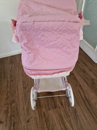 Cochecito bebé reborn rosa