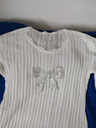 Jersey punto calado lazo lentejuelas
