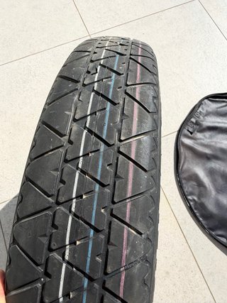 Rueda repuesto BMW con funda original