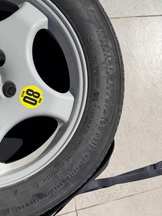 Rueda repuesto BMW con funda original