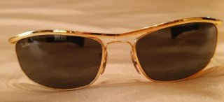 Gafas de sol Ray-Ban doradas y grises