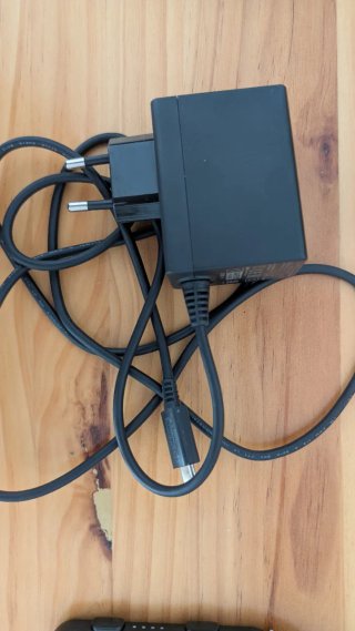 Nintendo Switch OLED (2 juegos de regalo) y caja