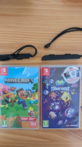 Nintendo Switch OLED (2 juegos de regalo) y caja