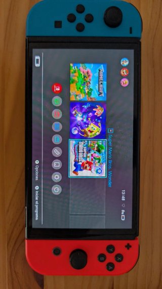 Nintendo Switch OLED (2 juegos de regalo) y caja