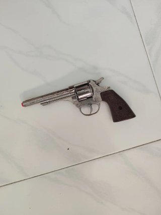 Pistola de pistones de juguete