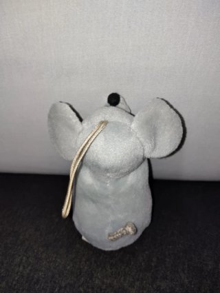Piccolo peluche topolino grigio con papillon blu