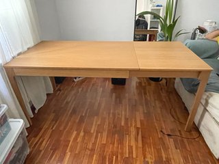 Mesa de comedor extensible de madera