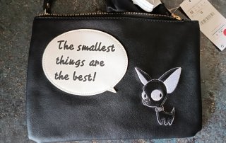 Bolso de mano con perro y frase