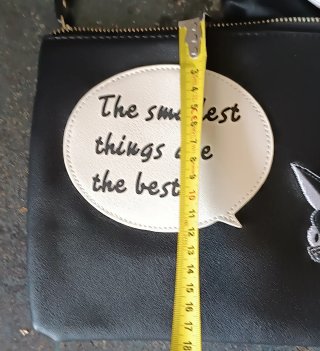 Bolso de mano con perro y frase