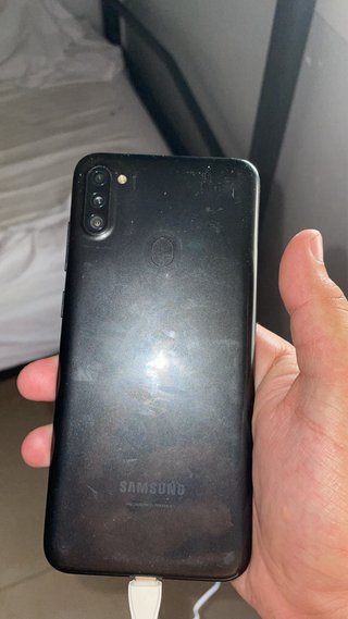 Teléfono Móvil Negro y Plateado