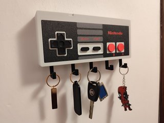 Colgador de llaves mando nes