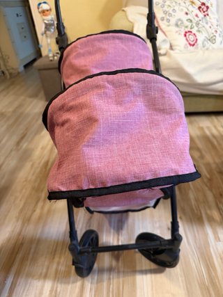 Carrito Muñecas Gemelas Rosa.