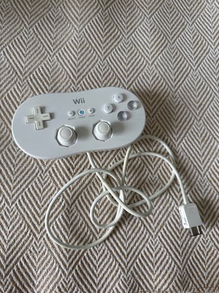 Pacchetto Nintendo Wii, include giochi e controller