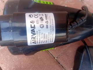 Aspirador de mano Airvac verde