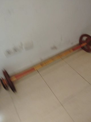 Barra de pesas con discos