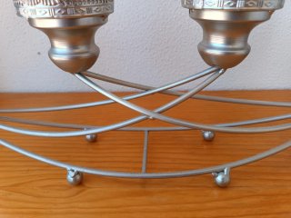 Portavelas de metal plateado