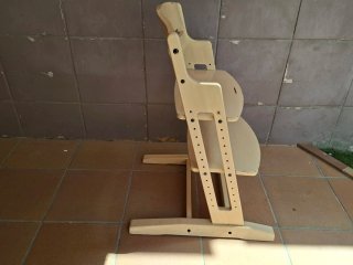Trona evolutiva de madera.