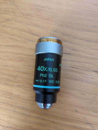 Objetivos de microscopio Nikon y Olympus