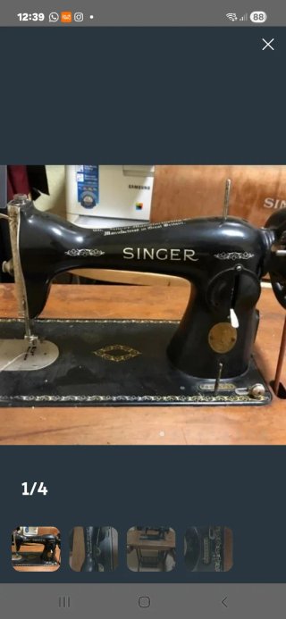 Máquina de coser Singer con mueble