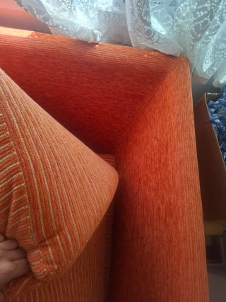 Sofá Cheslong Naranja con cogines