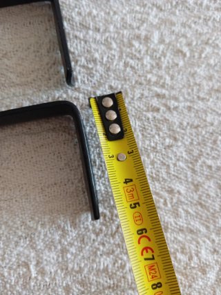 Dos ganchos para cortinas dobles