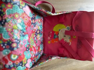 Silla elevador de viaje estampado floral