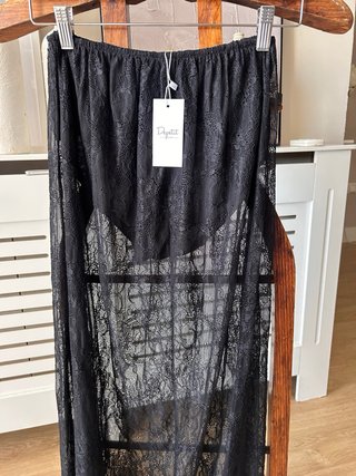 Falda midi encaje transparente negra