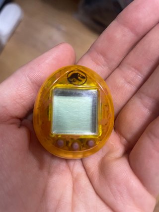 Tamagotchi Nano Jurassic World Naranja