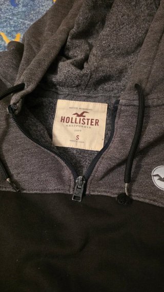 Sudadera Hollister gris y negra con cremallera