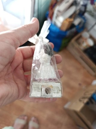 Lote 24 Muñeca de comunión sacapuntas