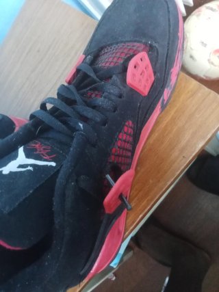 Jordan 4 Rosse e Nere