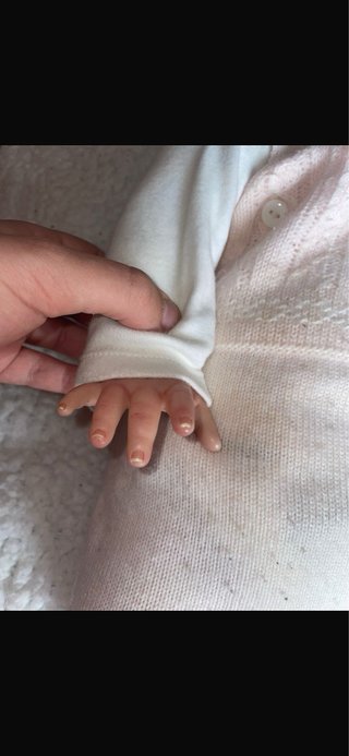 Muñeca realista bebé con chupete