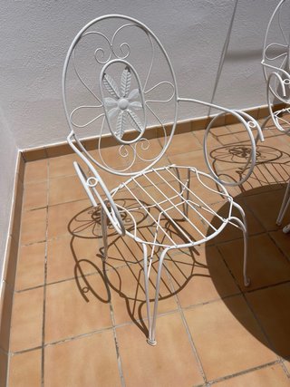 Mesa y 8 sillas de hierro y mármol