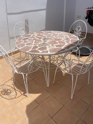 Mesa y 8 sillas de hierro y mármol