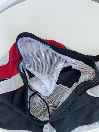 Pantaloncini corti uomo neri e rossi