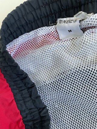Pantaloncini corti uomo neri e rossi