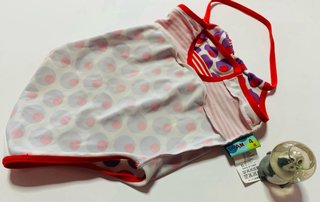 Bañador niña Dpam lunares morados y rojos