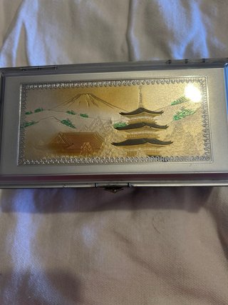 Joyero vintage musical dorado y plateado