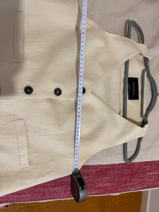 Chaleco de lino beige sin usar