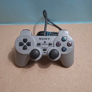 Playstation 1 con controller e giochi