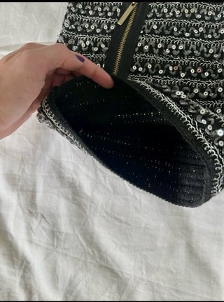 Pantalón corto lentejuelas negro y plata