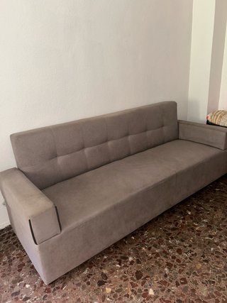 Sofá gris de tela