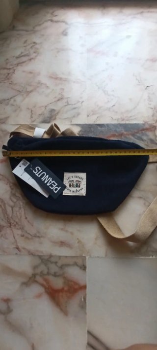 Riñonera azul y beige