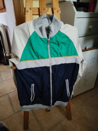 Sudadera Adidas reversible gris. Como nueva