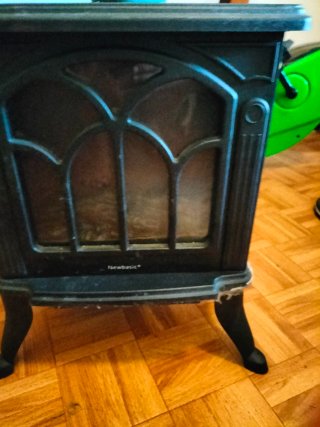 Estufa NewBasic Negra con Vidrio