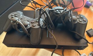 Playstation 2 Negra + 2 Mandos