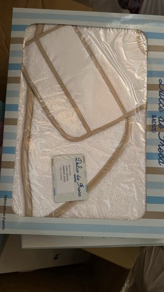 Capa de baño y babero para bebé