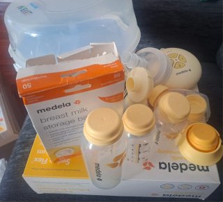 Sacaleches Medela Eléctrico y Esterilizador bibero