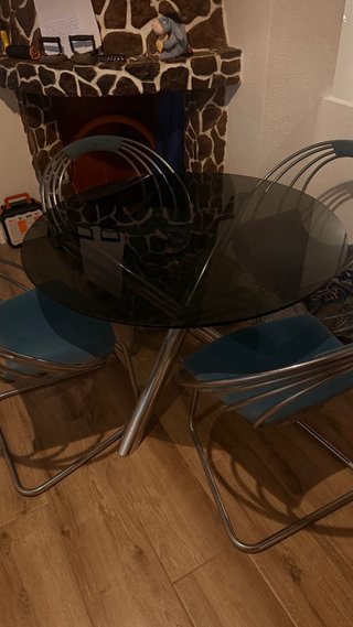 Sillas de comedor vintage azul y plateado.