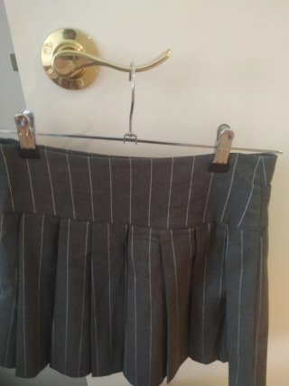 Falda plisada gris con cinturón niña talla 12-13